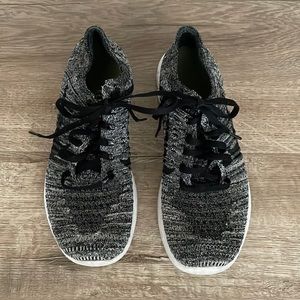 Black and white Nike shoes